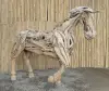 Product image 2 of the product “Horse in one piece, the head is from one piece of wood and carved head. The size is sbout 240cm lenght and 165cm height. ”
